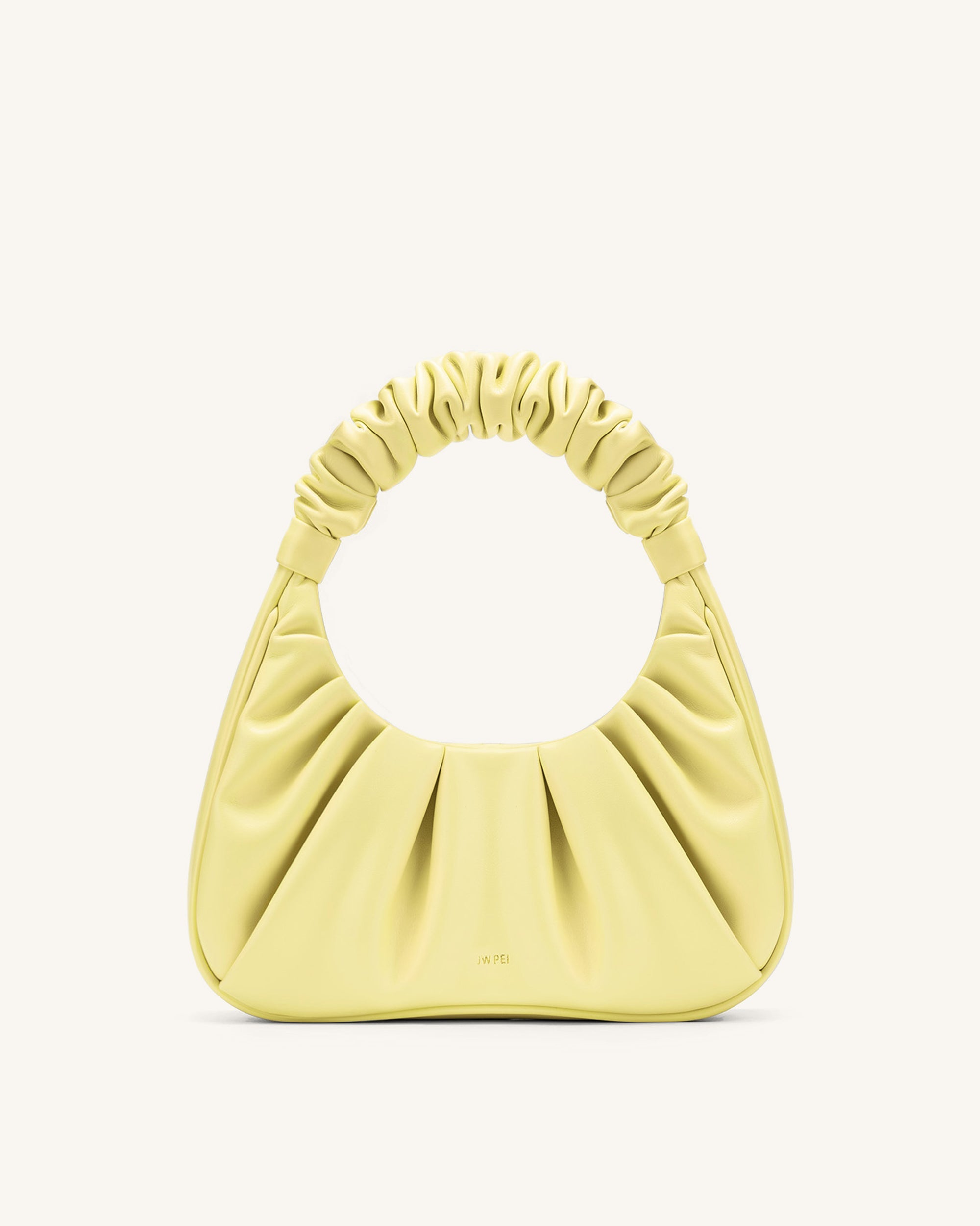 Light yellow clutch bag on sale